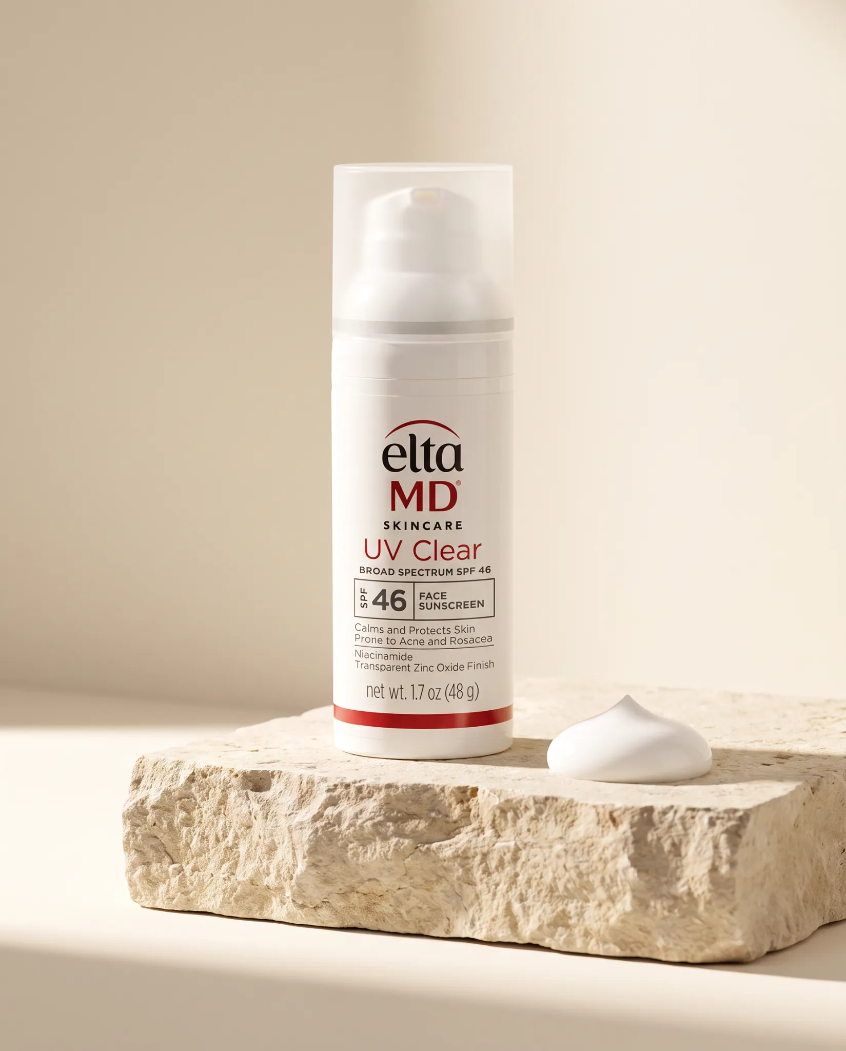 EltaMD UV Clear Broad-Spectrum SPF 46 sunscreen pump bottle on architectural stone