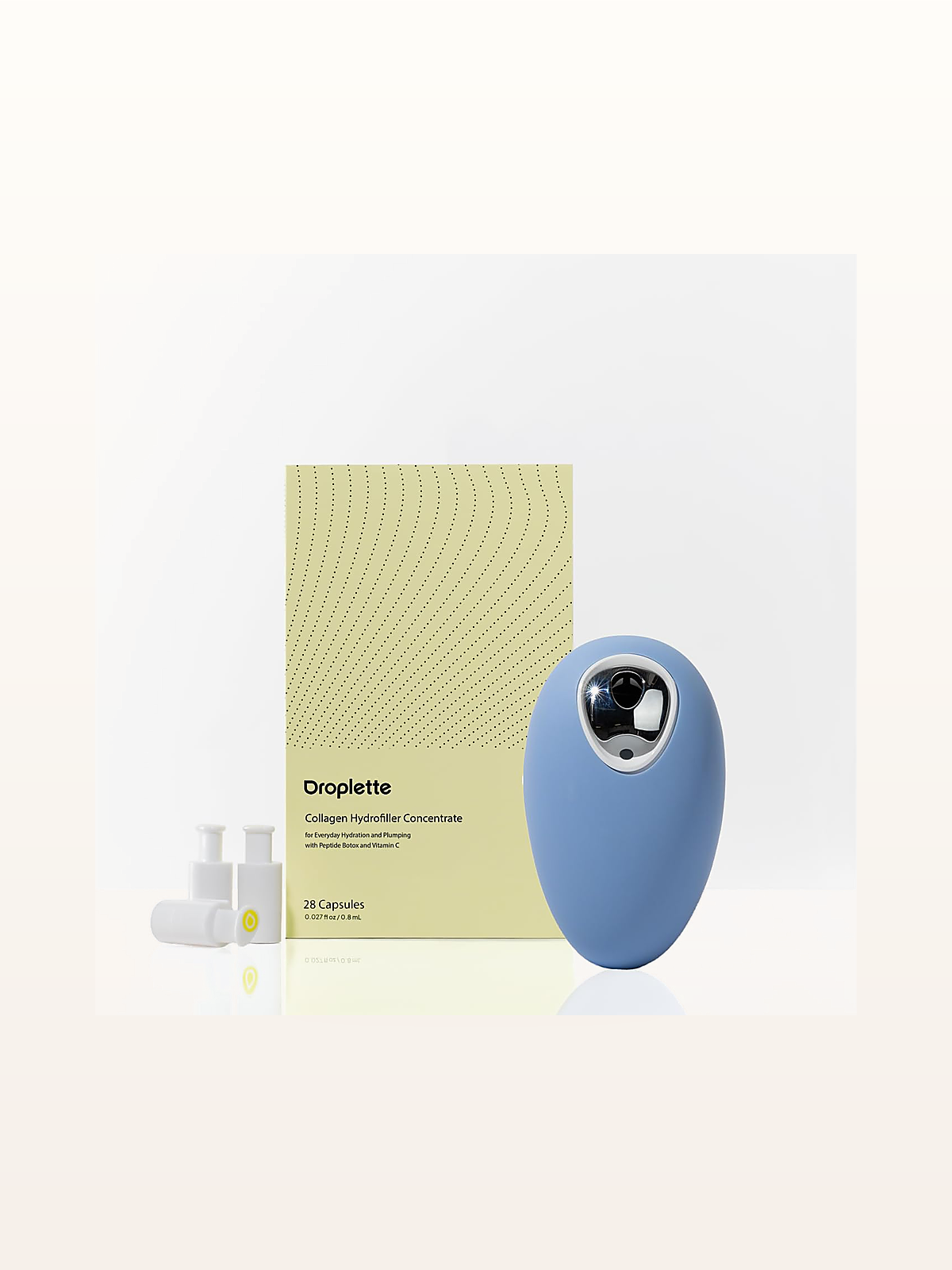 Droplette 2.0 Micro-Infusion Skincare Device clinical hardware on warm studio stage