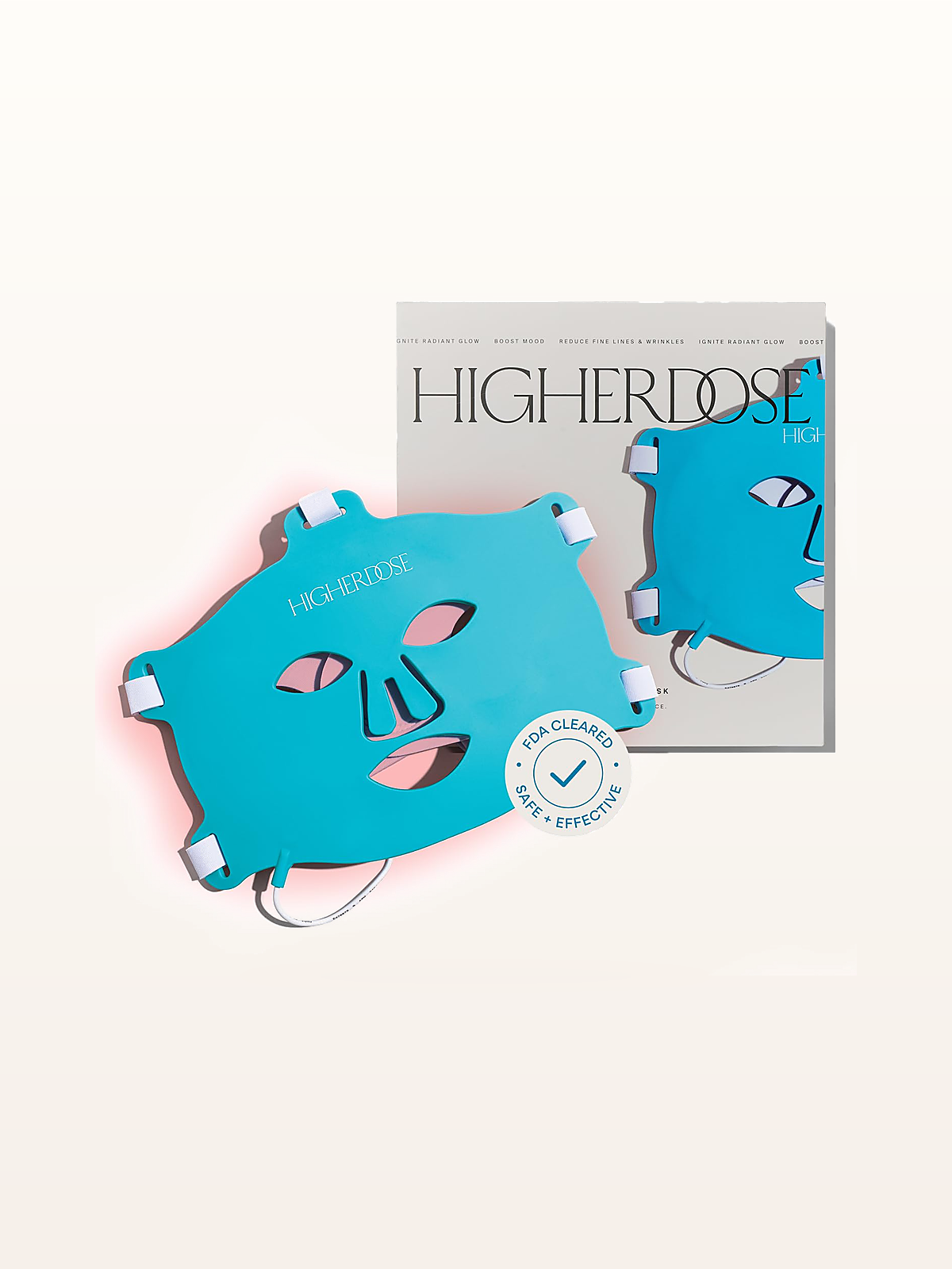 HigherDOSE Red Light Therapy Face Mask clinical hardware on warm studio stage