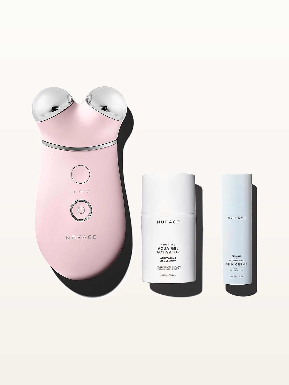 NuFACE Trinity+ Advanced Facial Toning Kit clinical hardware on warm studio stage