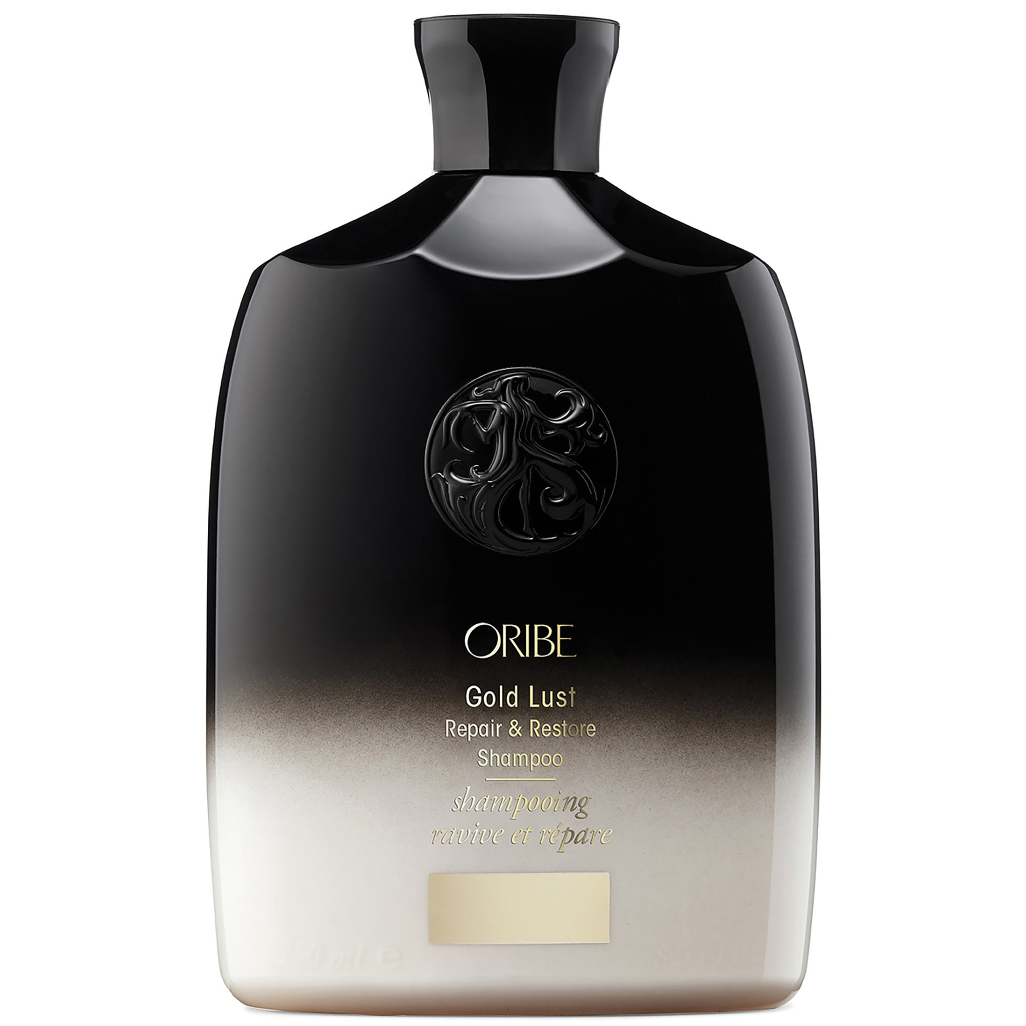 Oribe Gold Lust Repair and Restore Shampoo black and gold bottle on a clean white background.
